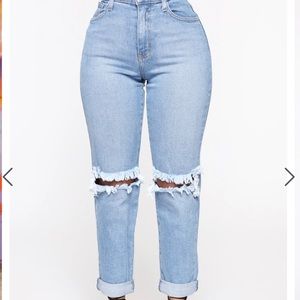 medium blue washed boyfriend jeans with knee rips